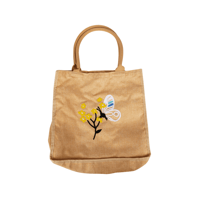 Bolso shopping beige con bordado de mariposas